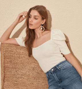 Blusa con manga de globo (56% descuento)